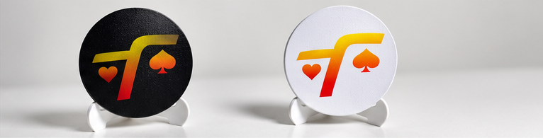 Matching gold-and-red logo artwork on black and white dealer buttons